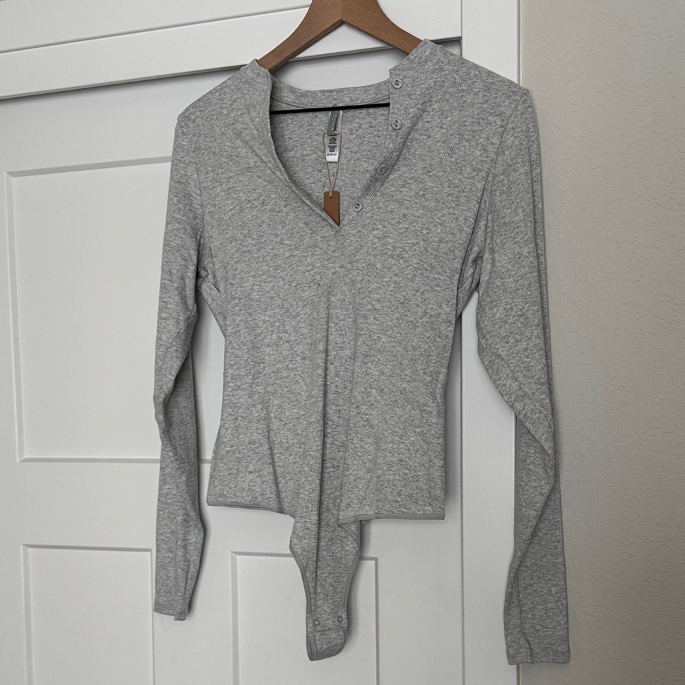 SKIMS cotton rib, long sleeve Henley Bodysuit